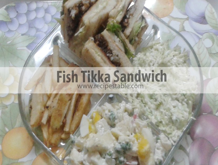 A simple fish tikka sandwich that can be made with any white fish fillets. Served on toasted bread slices with boiled egg, lettuce leaves and cabbage coleslaw. YUM YUM YUMMY Treat!!